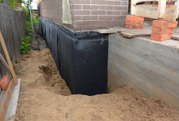 Happy homeowners after waterproofing job in Auburn Hills